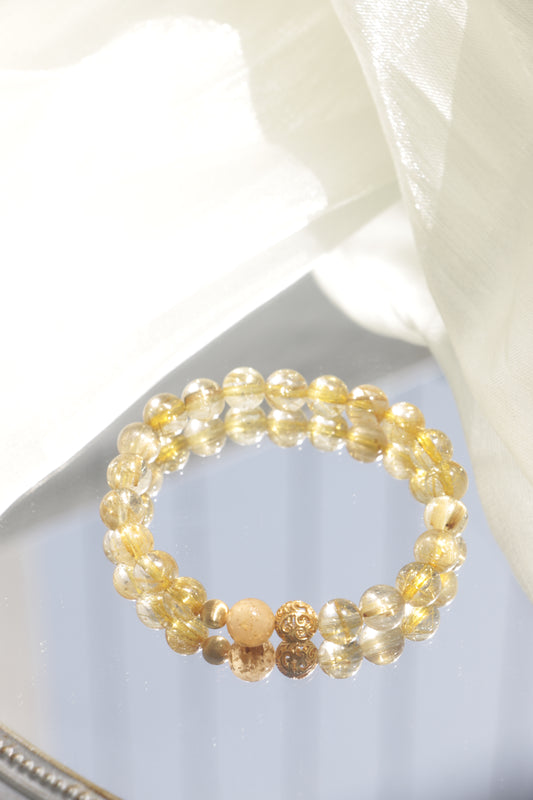 Twisted Silk Blonde Crystal Bracelet for Wealth and Business Growth
Rutilated Quartz Wealth Magnet Bracelet with Gold Accents
