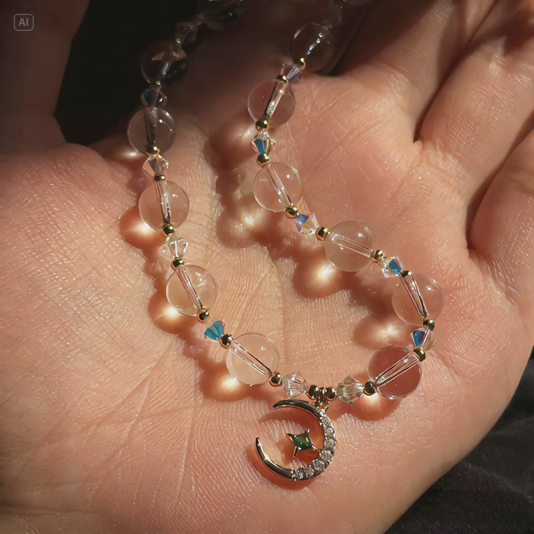 white crystal celestial necklace with sun moon and star pendant
