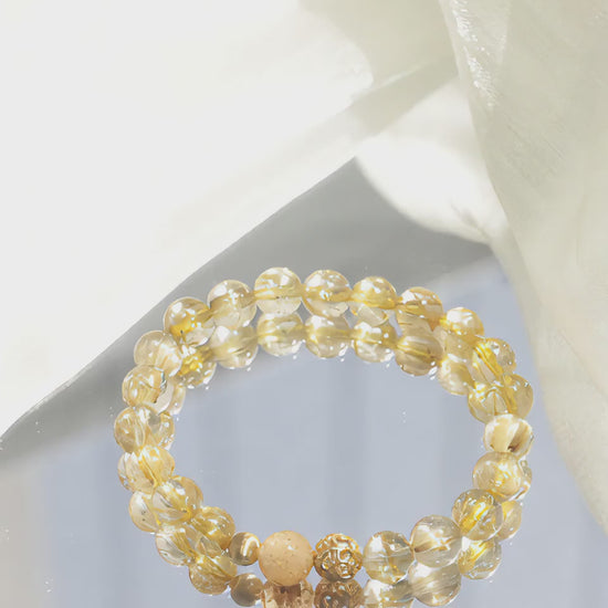 Primary: “Blonde Crystal Wealth Bracelet,” “Business Success Jewelry,” “Rutilated Quartz Bracelet”
Secondary: “Order Attraction Bracelet,” “Sales Growth Crystal Jewelry,” “Luxury Silk Bracelet for Wealth”
Long-Tail: “How to use crystals to attract clients,” “Best bracelet for closing deals”