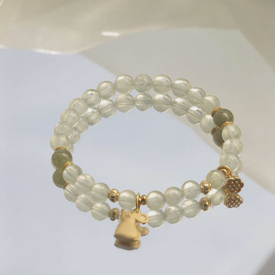 Primary: “Chinese Zodiac Rat Bracelet,” “Liuren Crisis Jewelry,” “Tsavorite Wealth Bracelet”
Secondary: “Grape Stone Prosperity Jewelry,” “贵人 Attraction Bracelet,” “Zodiac Protection Jewelry”
Long-Tail: “How to attract贵人 with zodiac jewelry,” “Best bracelet for financial stability”